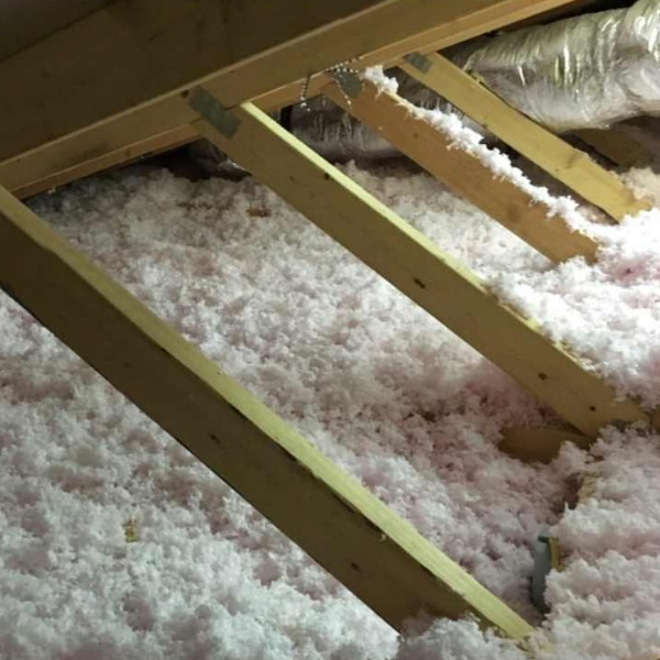 Newly installed attic insulation in homeowners attic
