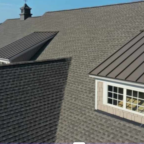 Newly installed architectural shingles on home.