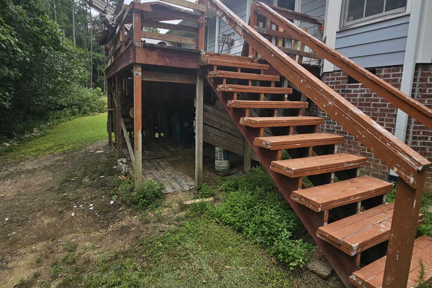 Before photo of old deck on rear of Fayetteville, NC home.